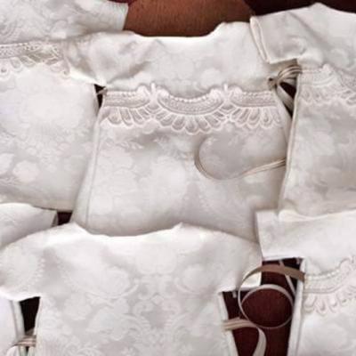 Woman Re-Purposes Wedding Dress Into Gowns For Stillborn Babies