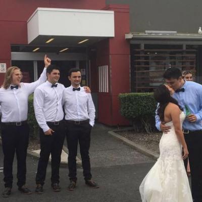 Bride and Groom Take Wedding Pictures Outside KFC