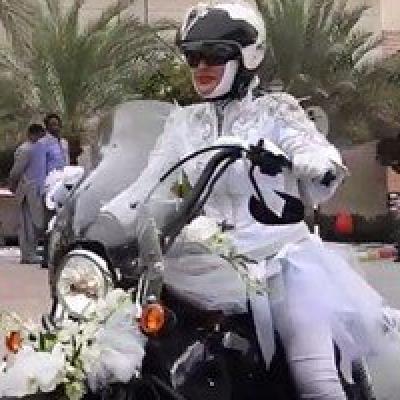 Emirati Couple Goes to their Wedding on a Motorcycle