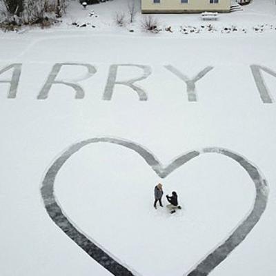 A Marriage Proposal Message Carved on Frozen Lake