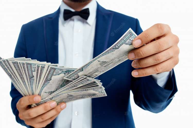 groom with money