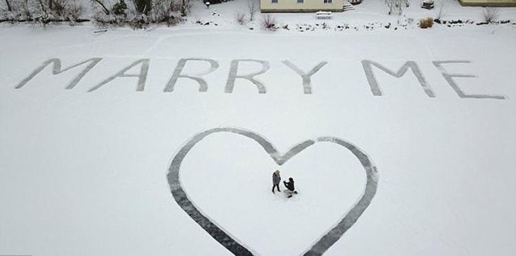A Marriage Proposal Message Carved on Frozen Lake