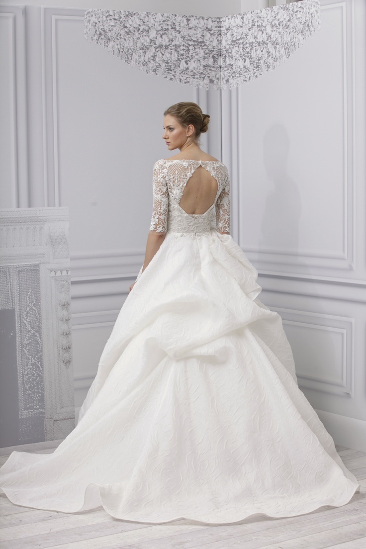 The Wedding Dress with a Dramatic Back - Arabia Weddings